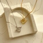 آویز قلب بالدار با نگین متحرک