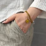 دستبند دو لاین کارتیر با سکه ورساچه 